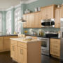 the combination between North American maple kitchen cabinets and Whyte Blue wall paint