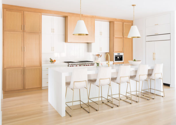 a contemporary kitchen with light oak cabinets and benjamin moore white heron wall paint