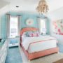 a coral and blue themed transitional bedroom with underwater feel