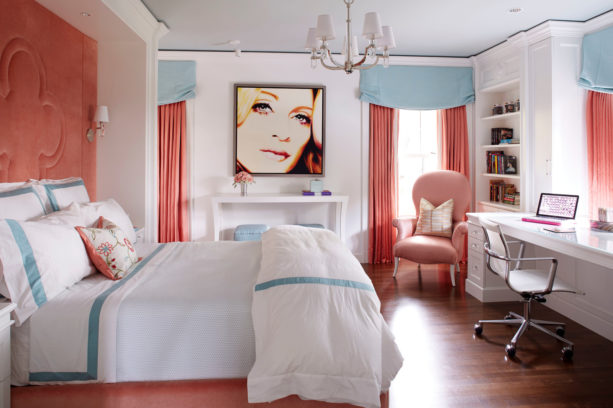 teenage girl’s bedroom with coral and pastel blue colors