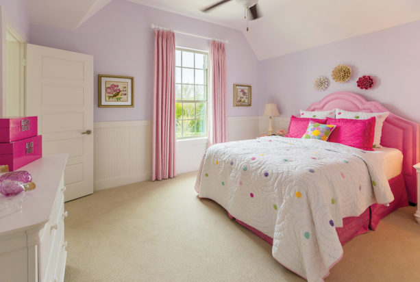 a girl’s bedroom with the combination of soft purple and bright pink