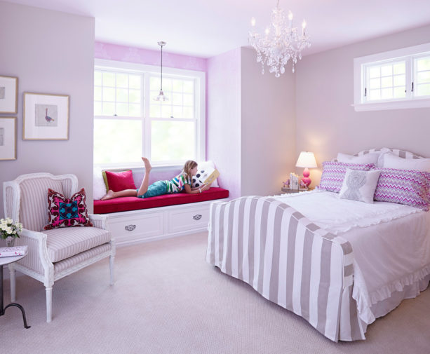 a soft purple and white traditional girl’s bedroom with a bold magenta pink touch