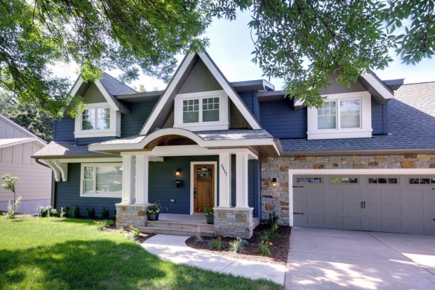 a traditional blue note exterior with white trim