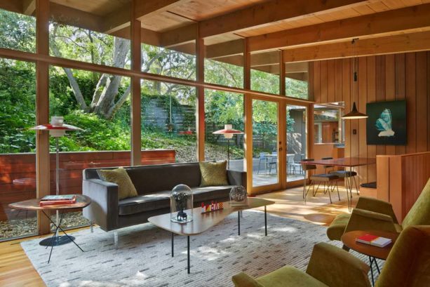 open-style mid-century modern living room with clear-finished solid oak floor