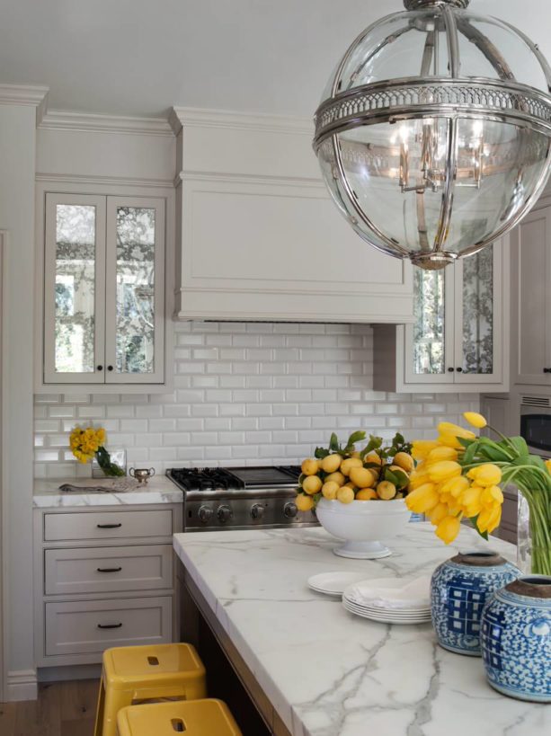 white subway tile and white grout showing a traditional feel in a Victorian kitchen