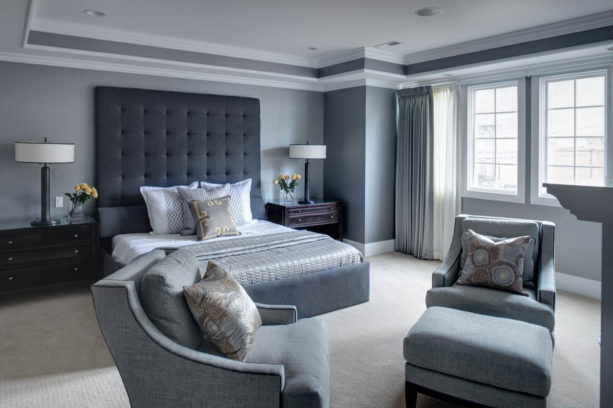 bone white carpet flooring as a pair for a medium grey wall tone in a transitional bedroom