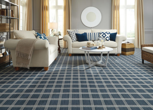spruce blue square-patterned carpet flooring to match light grey walls in a traditional living room