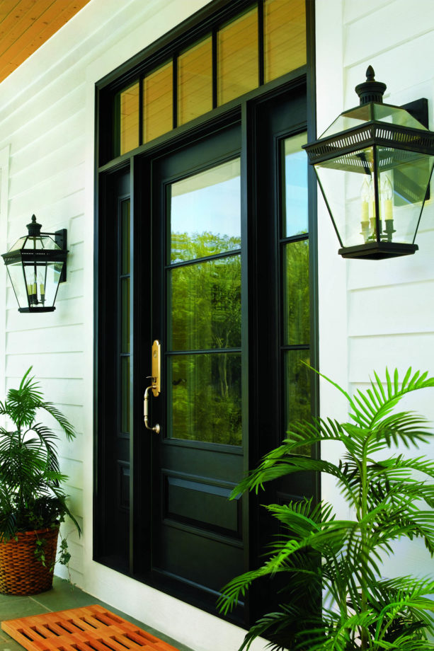 a bold black single front door with sidelights and transom by Andersen Windows and Doors