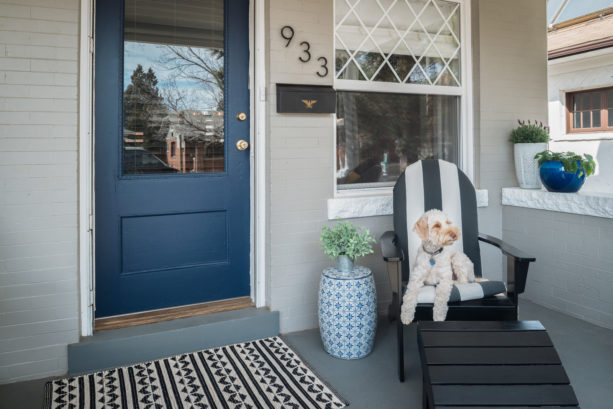 navy blue entry for a gray house and white trim combination