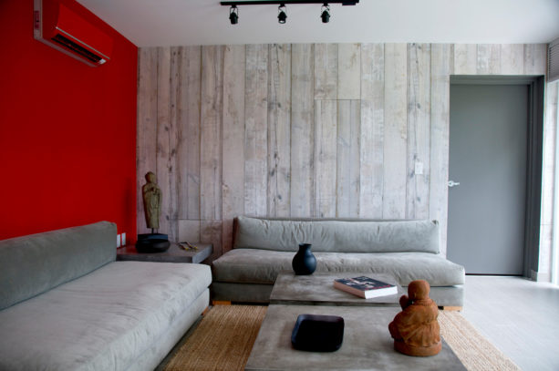stunning and bold red and grey wall design in a contemporary living room