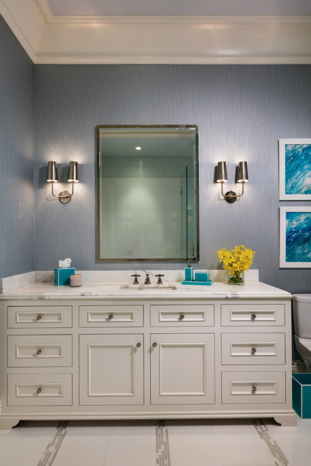 a modern bathroom with Santorini blue and white color scheme