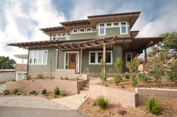 an idea for transitional ranch style design with flat roof and vinyl siding