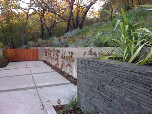 ideas to stabilize steep slopes with stacked bluestone retaining wall