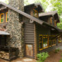 combination of solid stain color of siding and semi transparent log cabin exterior paint