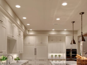 elegant white shaker floor to ceiling cabinets in benjamin moore dove white