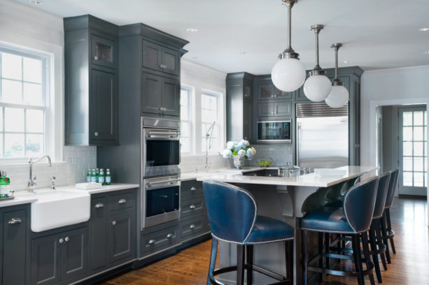 blue gray bronze kitchen cabinets combined with beveled subway tile
