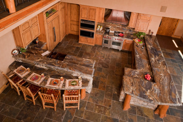 blue storm granite countertops kitchen peninsula with oak stools seating