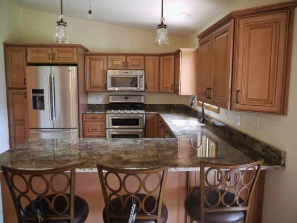granite countertops kitchen peninsula with country cottage stools seating