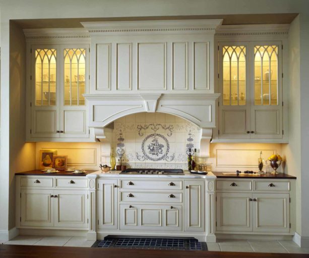 multicolored discovertile backsplash behind stove only in a french style kitchen