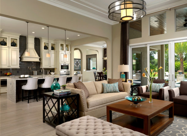 black and white pullman kitchen and beige transitional living room combo