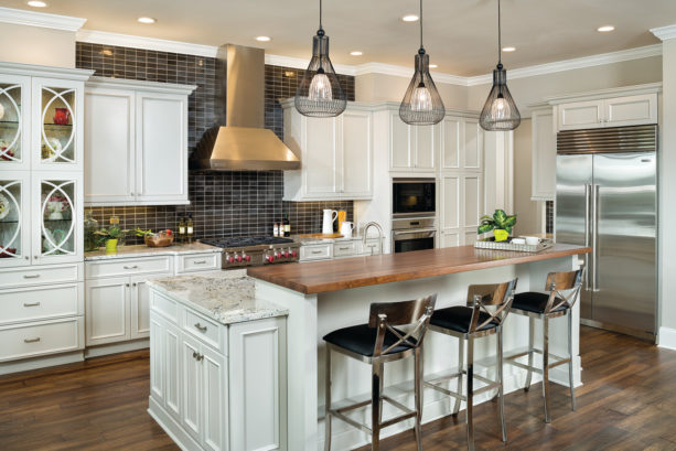 combination of granite and wood countertops in a two-level kitchen island