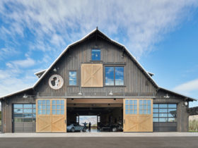 half x brace side sliding exterior barn door designs for a large country garage