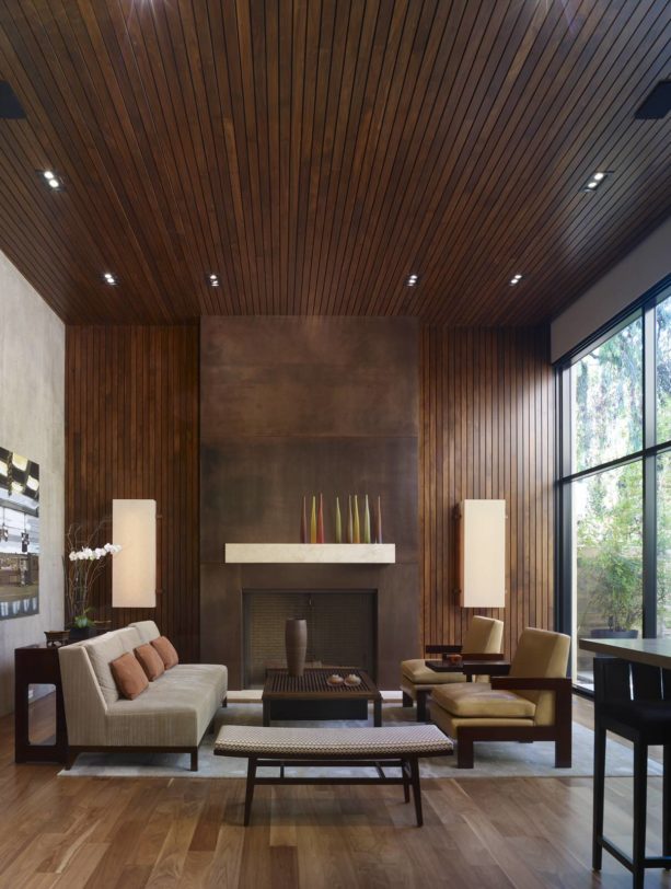 minimalist open concept living room with vertical wood slat wall paneling