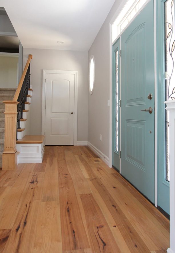 small foyer entryway with hickory flooring idea