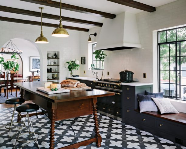 black and white cement tile kitchen floor to create a graphic look