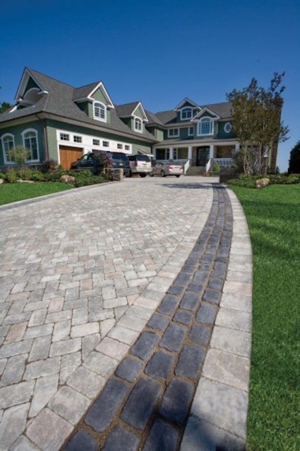 brussels block driveway with courtstone accent to widen the area