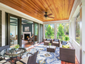 combination of wood ceiling, railing, and screen to enclose a porch for living space