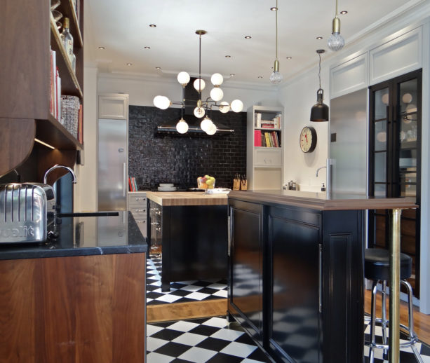 quartz black and white tile combined with medium tone wood kitchen floor