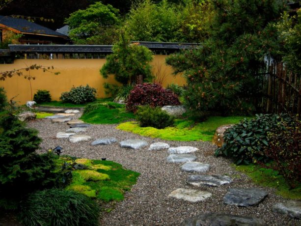 asian landscaping with pea gravel walkway and natural stones for stepping