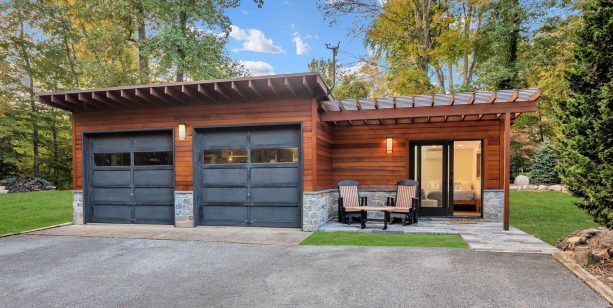 corrugated metal mid-century garage doors combined with wood siding