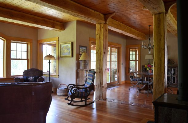 decorating support beam with a light tone rustic style wood