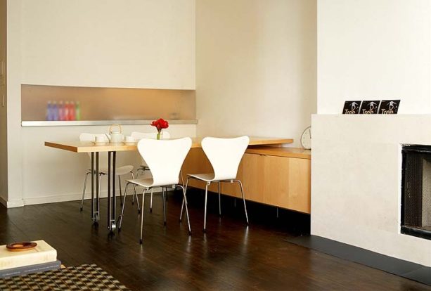 gliding dining table on top of a console table and against the wall