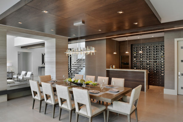 open concept modern dining room with custom bar