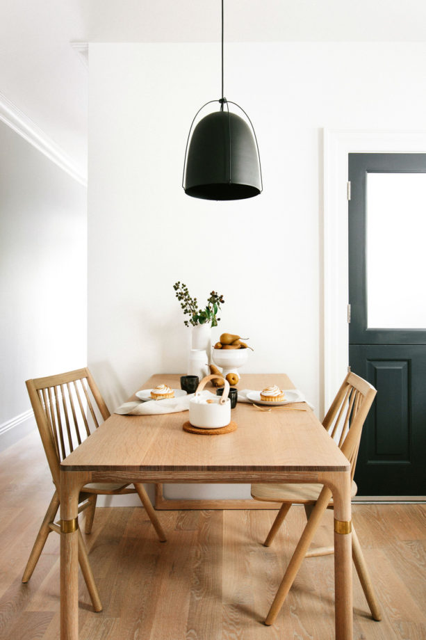 scandinavian dining table against the white wall