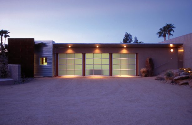three-car garage doors with uplight in mid-century design
