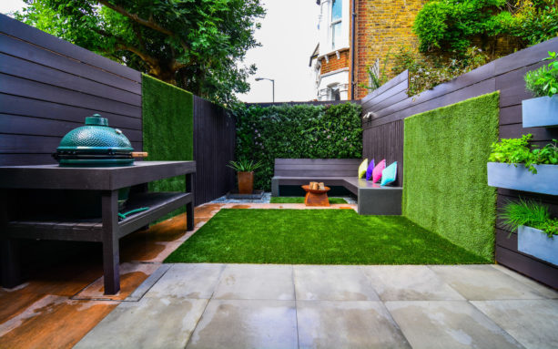 unique small backyard with a concrete paver trendy patio and vertical garden