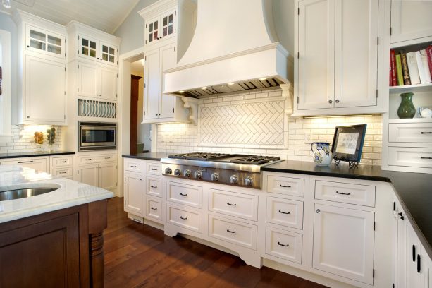 snowcap white cabinets with black glass hardware
