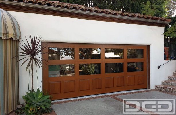 combination of wood and clear glass panels in an eclectic garage door