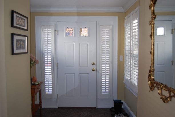 custom made plantation shutters as a window treatment for sidelight