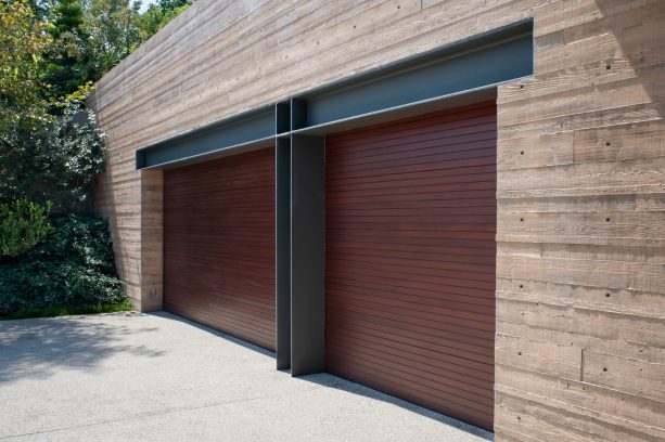 mahogany wood garage door panels with metal trim