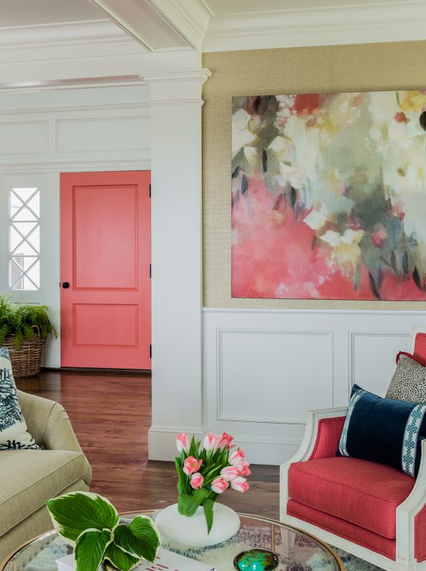 beach style hall with coral front door to create a colorful look