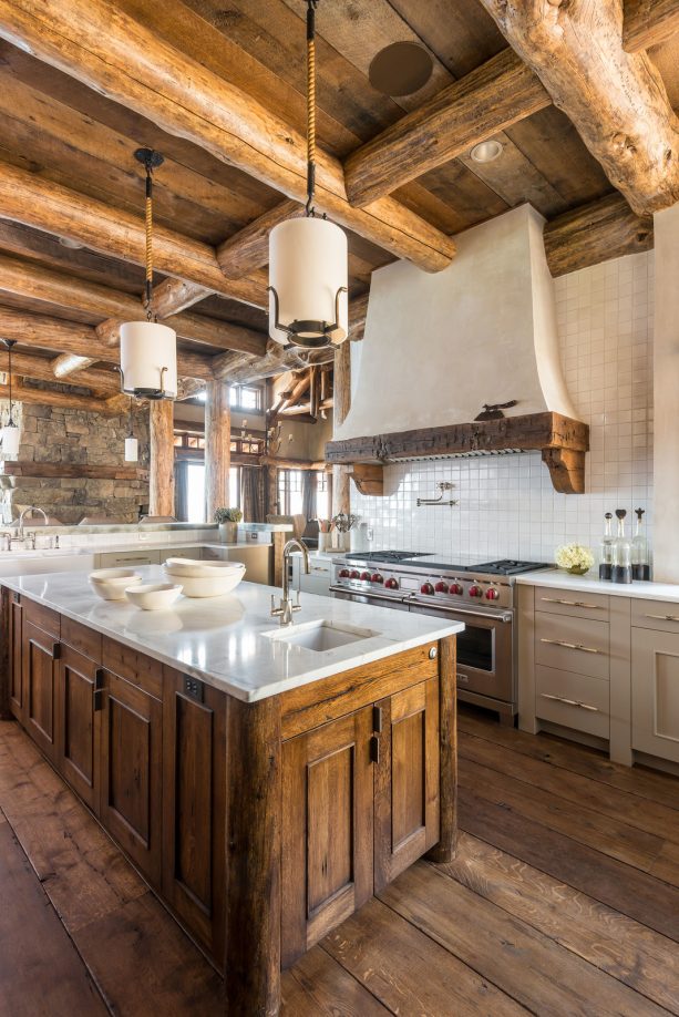 combination of beige, white, and wood element in a log cabin kitchen