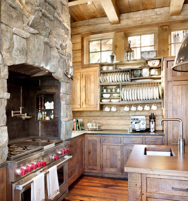 combination of reclaimed oak and natural stone element in a log cabin kitchen