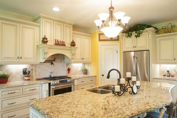 distressed white cabinets with a canary yellow wall as an accent