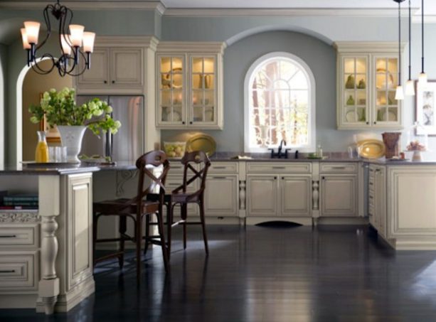 stylish classic kitchen with a distressed white beaded inset cabinet and straight blue wall