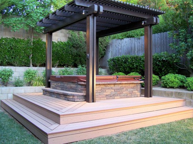 craftsman-style floating deck with a pergola used for the spa